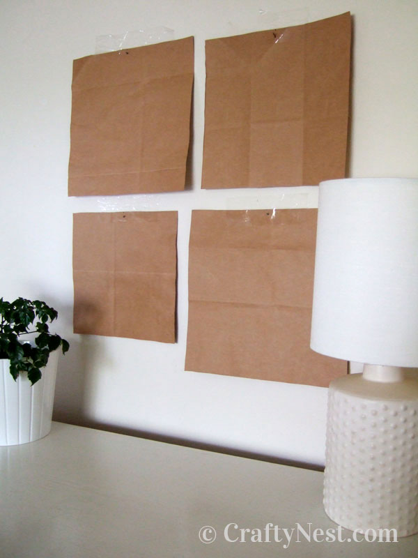 how-to-diy-framed-doilies-crafty-nest Pieces of brown paper taped to the wall, photo