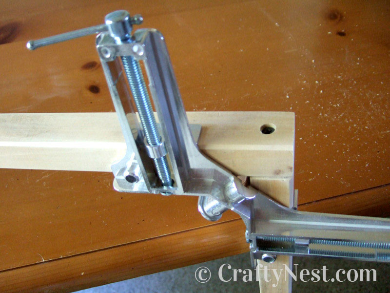 screws-diy-bulletin-board-with-shutters-crafty-nest Screw together the corners while clamped, photo