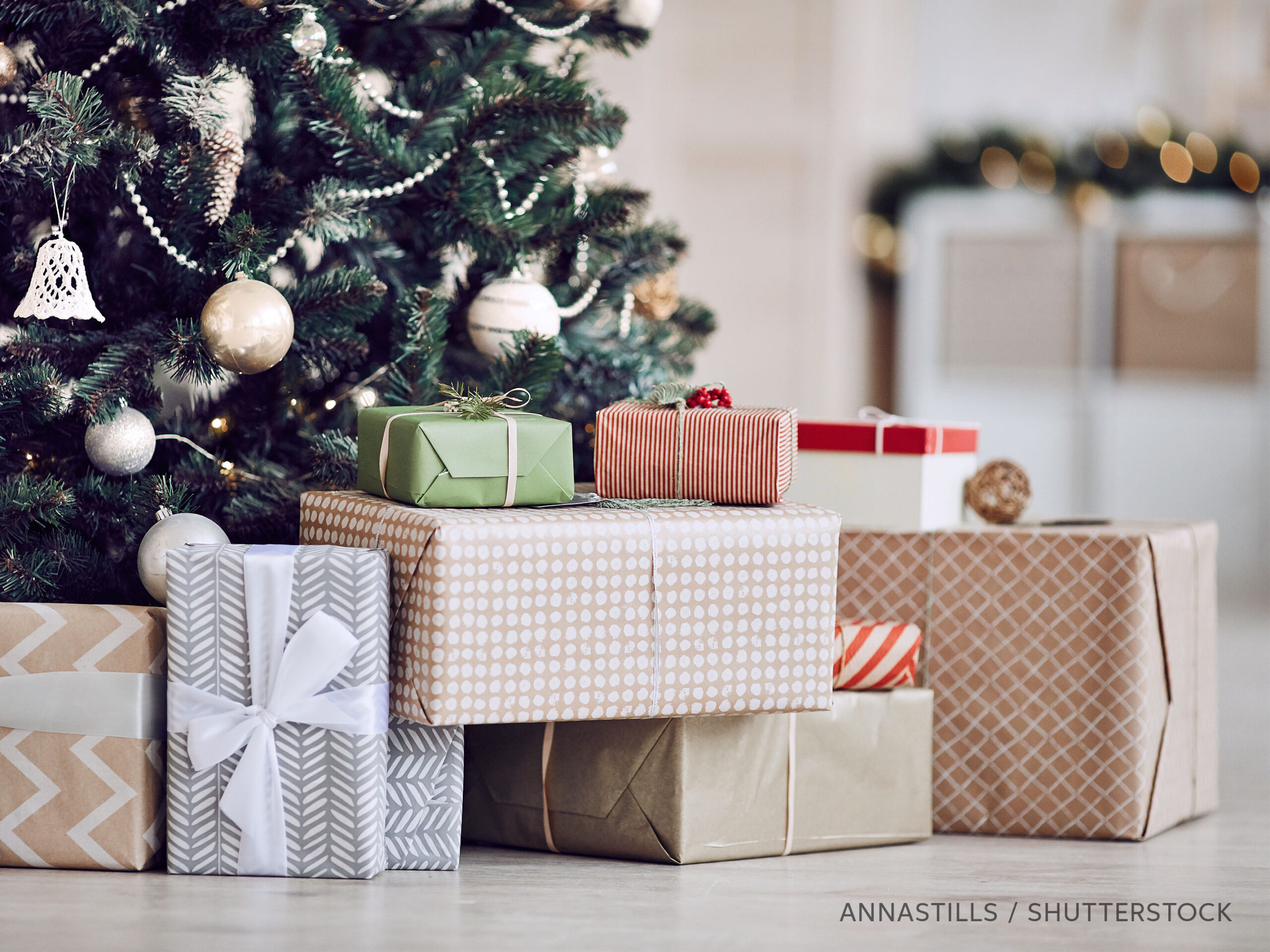 hero-part-6-cr-handmade-holiday-gift-ideas-crafty-nest-shutterstock-1551662387 Wrapped gifts under a Christmas tree, photo