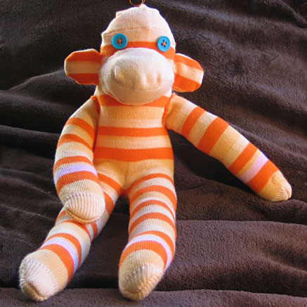 sockMonkeyMake Orange striped sock monkey, photo