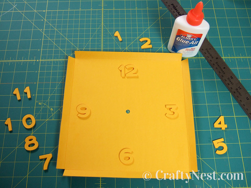 howto9-embossed-numbers-clock-crafty-nest Start placing the numbers, photo