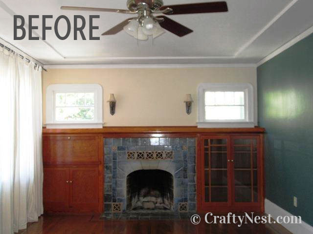 fireplace-navy-blue-feature-wall-crafty-nest Teal wall in living room, before photo
