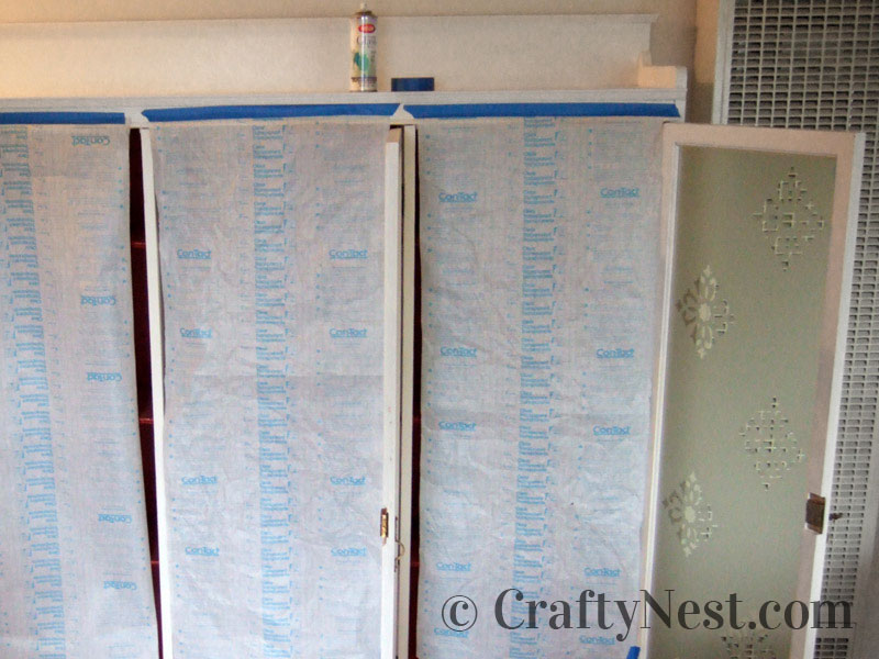 coverup-diy-faux-frosted-glass-crafty-nest Cover the exposed shelving, photo