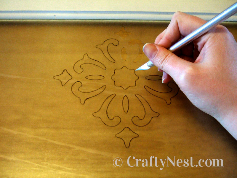 cut-out-diy-faux-frosted-glass-crafty-nest Cutting out the pattern, photo