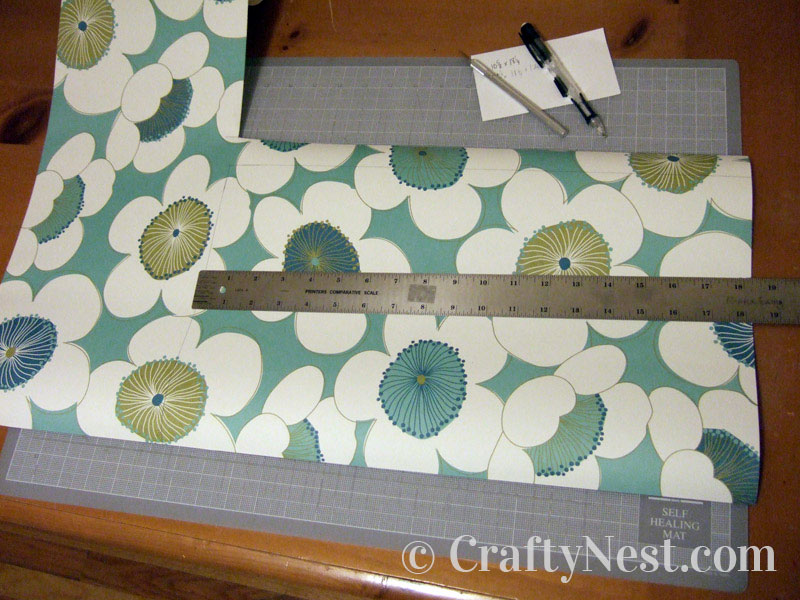 cutting-paper-diy-salvaged-drawers-modular-bookcase-crafty-nest Cutting the decorative paper, photo