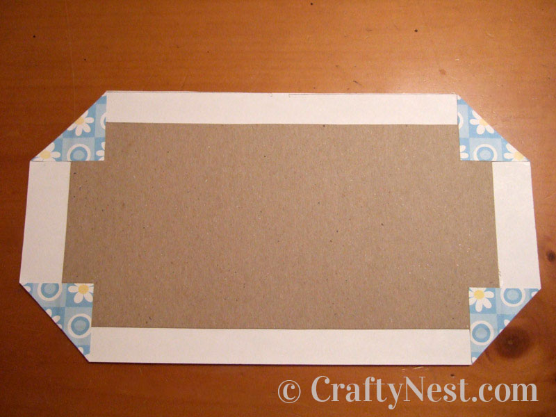 folding-corners-diy-mini-bound-books-crafty-nest Decative paper folded at the corners of the chipboard, photo