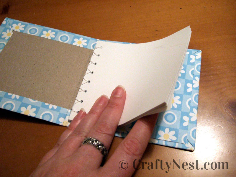 glue-back-page-diy-mini-bound-books-crafty-nest Glue the back page onto the cover, photo