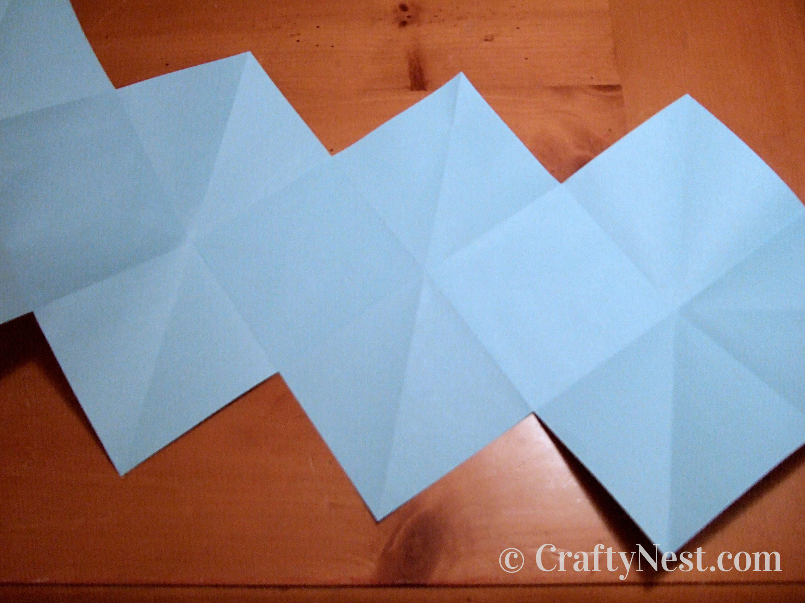 gluing-pages-accordion-books-crafty-nest Corners of papers glued together, photo