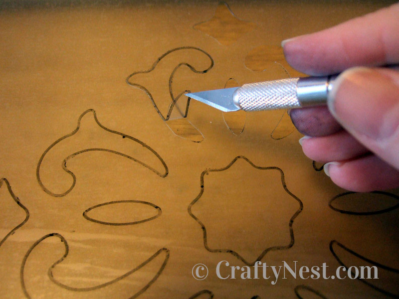 lift-with-knife-diy-faux-frosted-glass-crafty-nest Peel back the pieces, photo