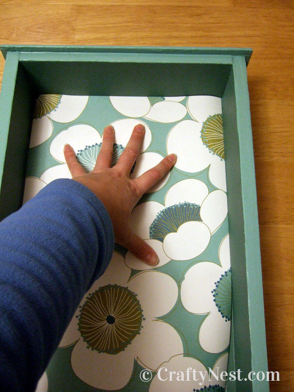 placing-paper-diy-salvaged-drawers-modular-bookcase-crafty-nest Insert the paper in the drawers, photo