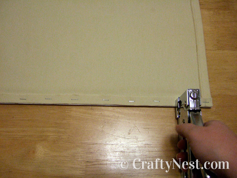 staple-bottom-diy-postcard-collage-crafty-nest Staple the bottom edge to the wood, photo