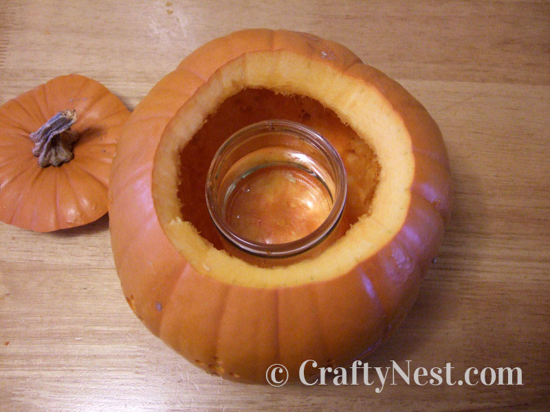 water-jar-diy-pumpkins-carved-with-a-drill-crafty-nest Jar of water inside the pumpkin, photo