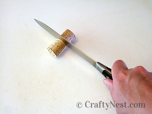 DSCF4504-wine-cork-trivet-crafty-nest Cut each cork in half, photo
