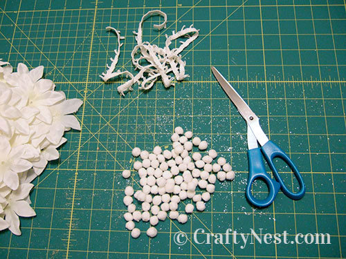 DSCF5233-two-paper-lanterns-flowers-pom-poms-crafty-nest Cut the pom poms off the fringe, photo