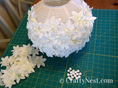 DSCF5236-two-paper-lanterns-flowers-pom-poms-crafty-nest Glue flowers onto the lantern, photo