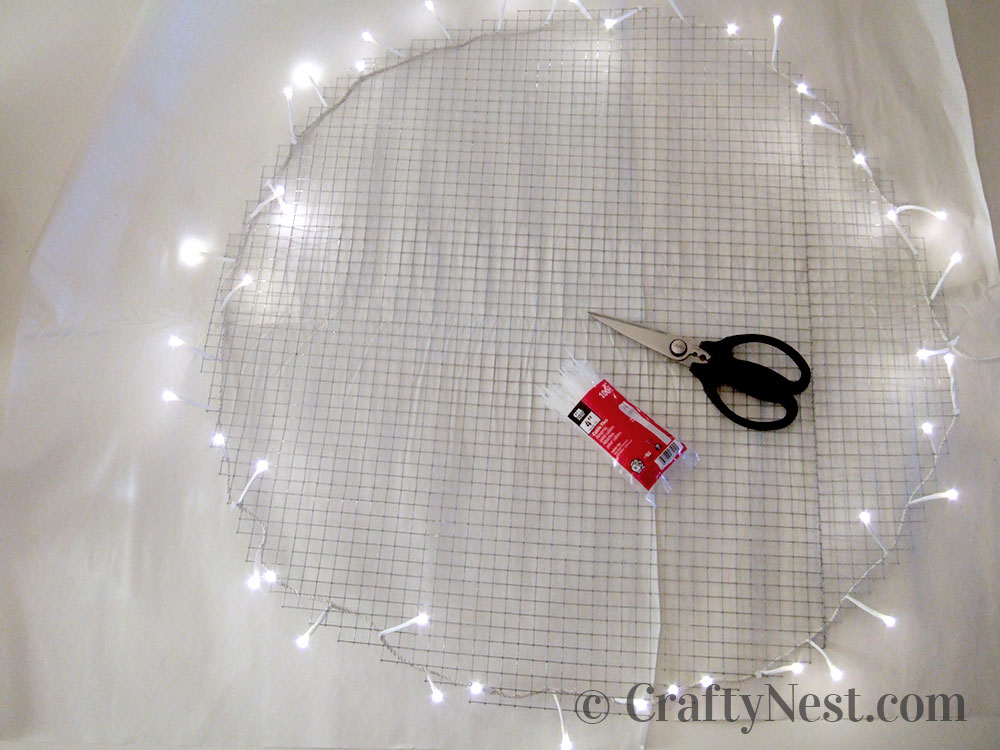 DSCF7723-coffee-filter-snowball-wall-light-crafty-nest Attach lights around outside edge, photo