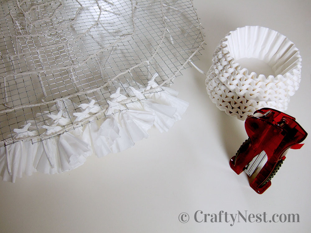 DSCF7902-coffee-filter-snowball-wall-light-crafty-nest Supplies for stapling the coffee filters, photo
