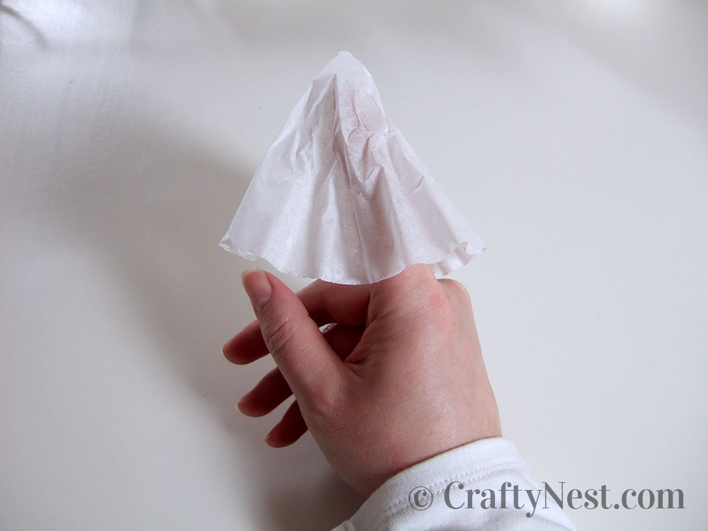 DSCF7904-coffee-filter-snowball-wall-light-crafty-nest Finger in the middle of a coffee filter, photo