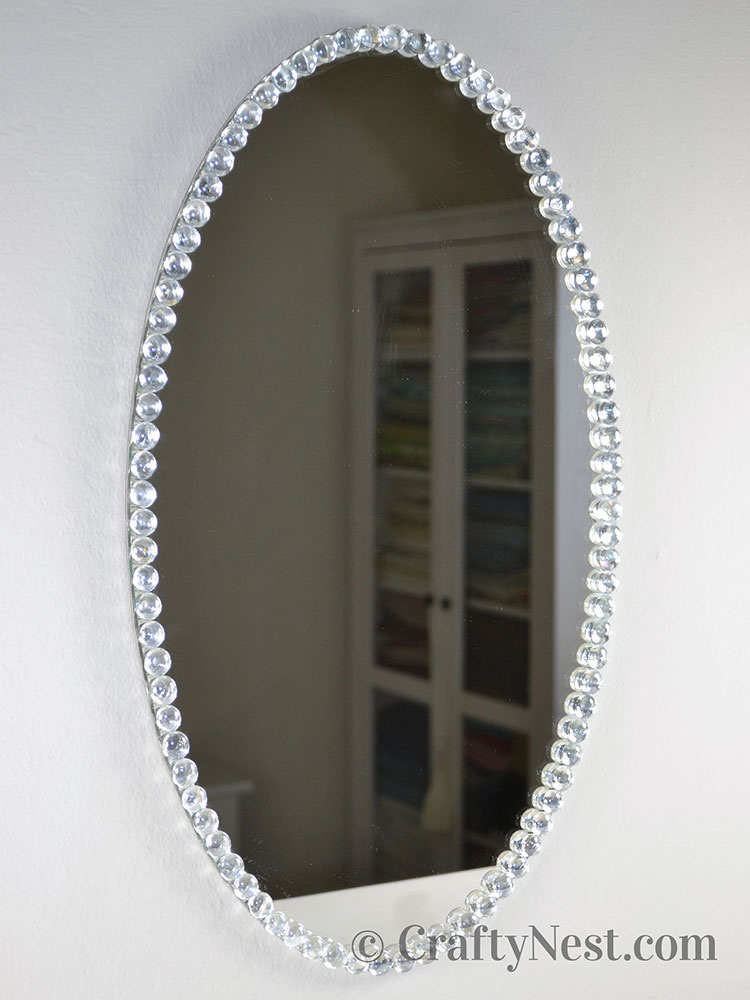 DSC_0004-beaded-glass-framed-mirror-crafty-nest Finished mirror hung on the wall, photo