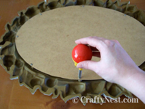assemble-ugly-plastic-mirror-cork-board-crafty-nest Reassemble the frame, photo