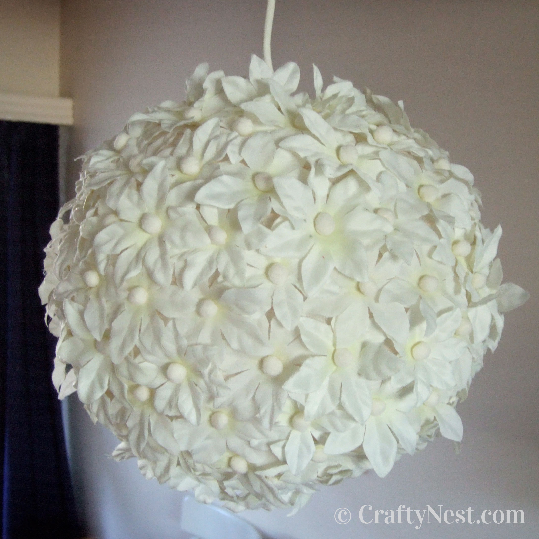 flowers-two-paper-lanterns-flowers-pom-poms-crafty-nest Hang the flower lantern, photo