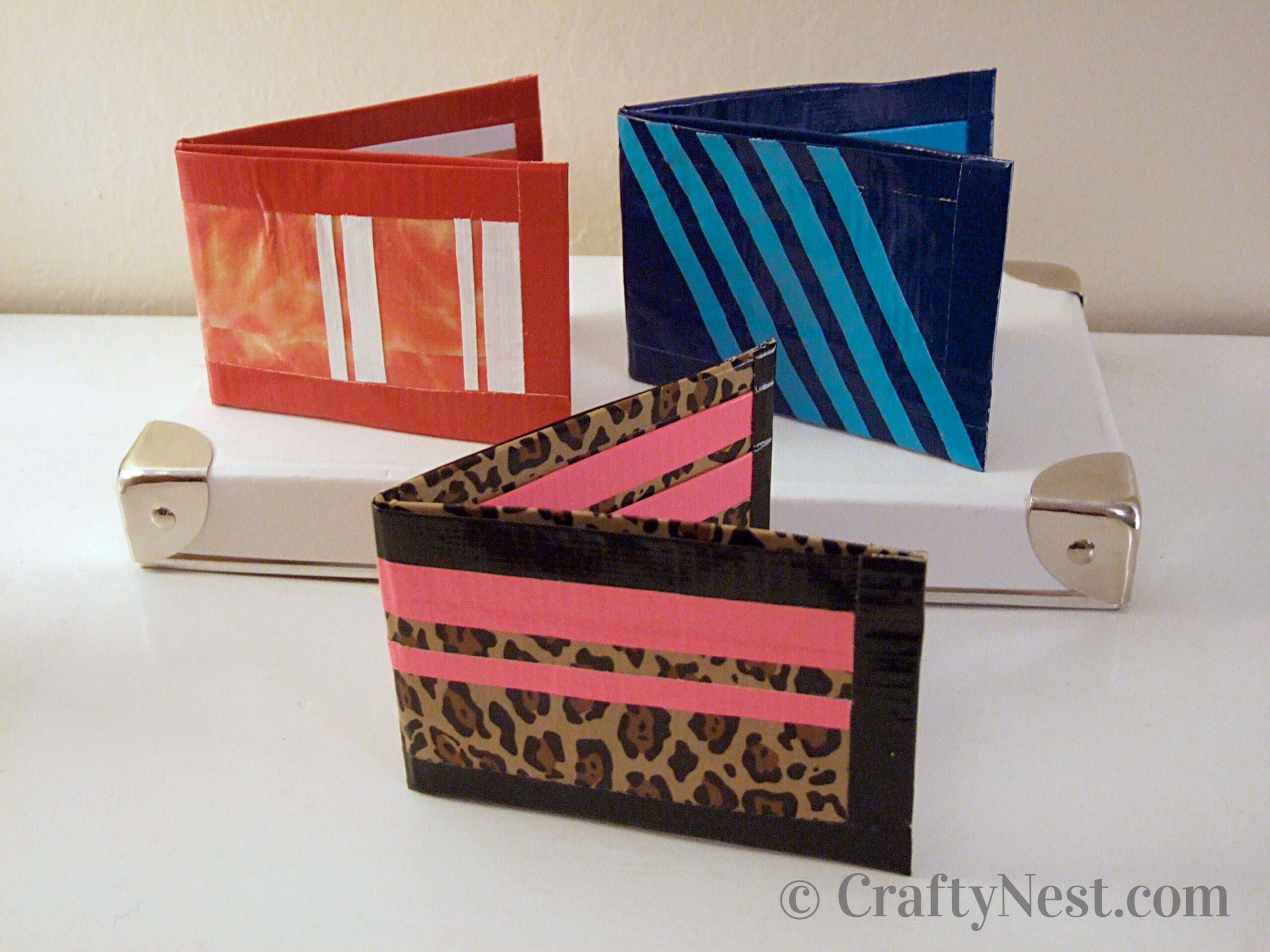 hero-camp-craft-duct-tape-wallets-crafty-nest Three handmade duct tape wallets, photo