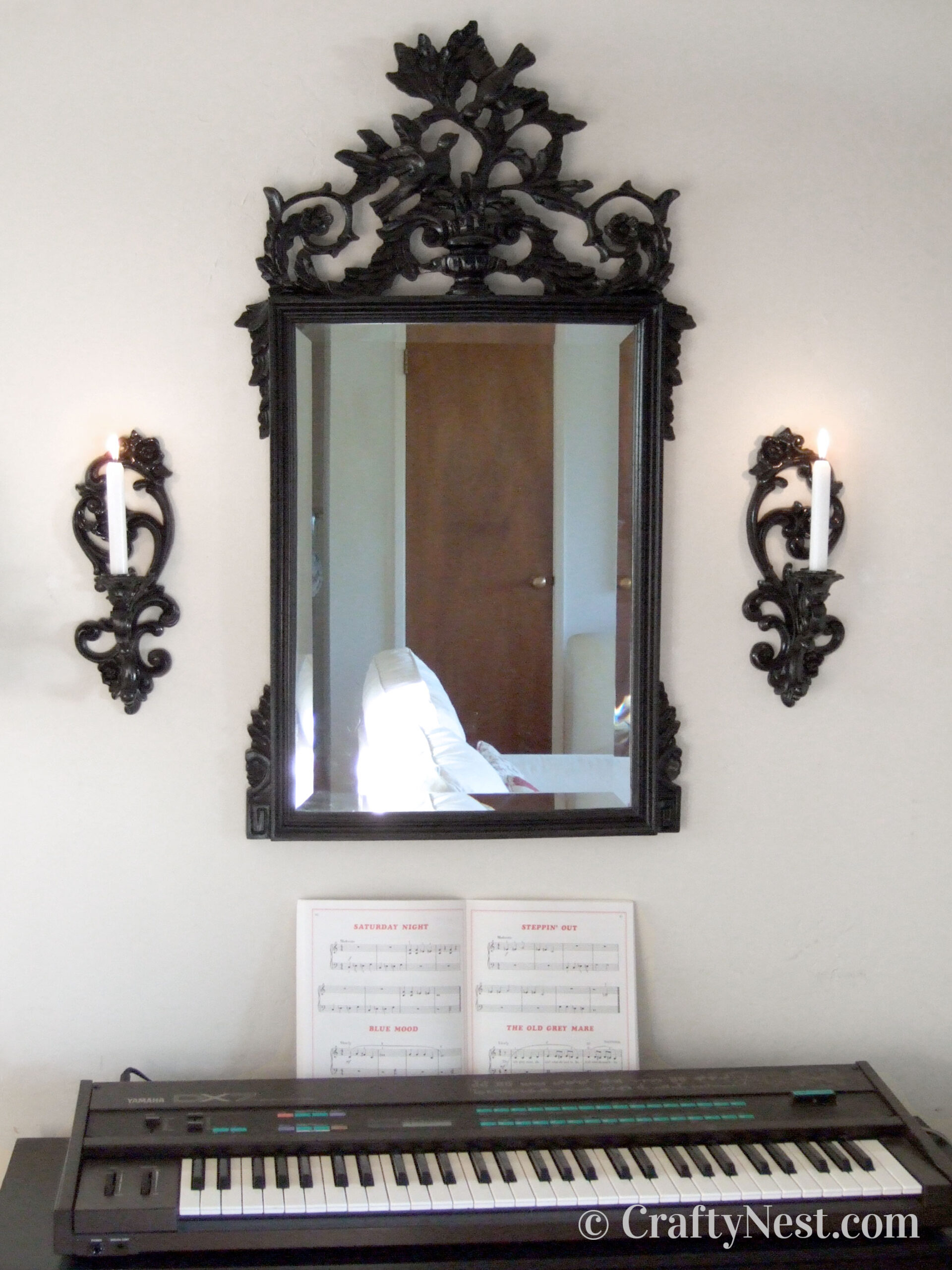 hero-thrift-store-candle-sconces-crafty-nest Sconces painted to match a mirror, photo