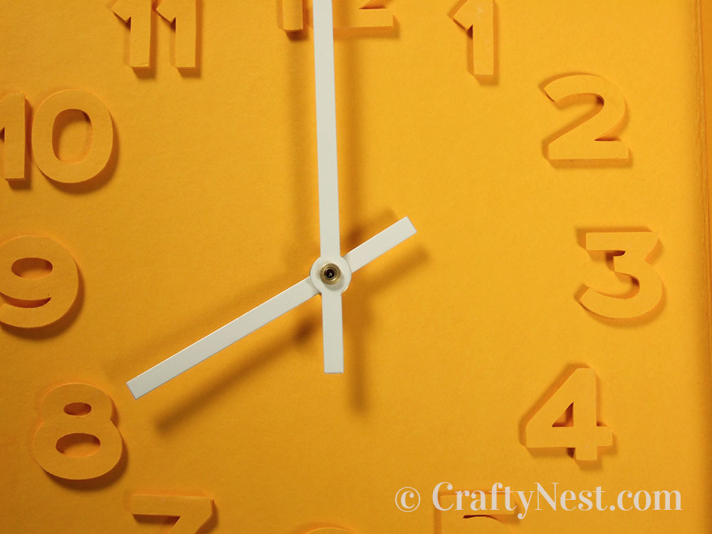 howto12-embossed-numbers-clock-crafty-nest Close-up of the clock face, photo