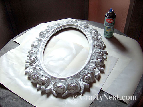 paint-ugly-plastic-mirror-cork-board-crafty-nest Screw together the corners while clamped, photo