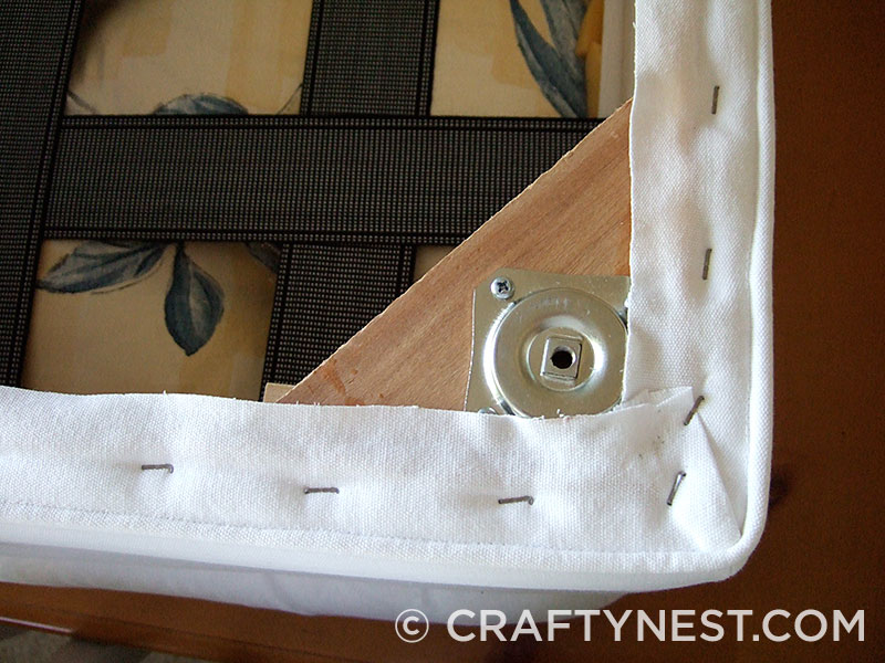DSCF0782-reupholster-an-ottoman-crafty-nest Staple on the cover, photo