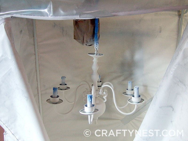 DSCF7294-chandelier-makeover-the-tutorial-crafty-nest Spray paint the chandelier inside a tent, photo