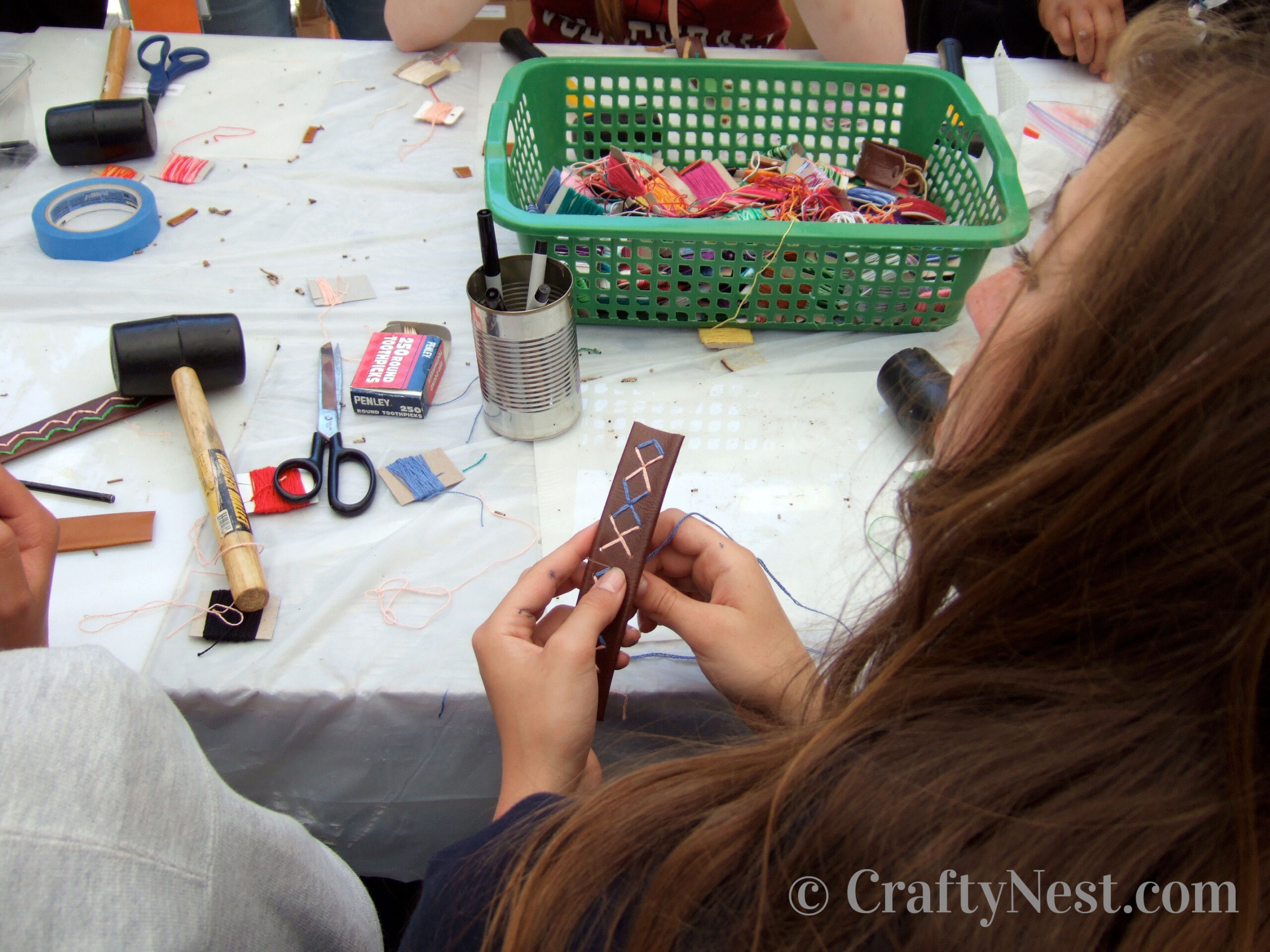 DSCF7424-stitched-leather-bracelets-crafty-nest Girls making bracelets at camp, photo