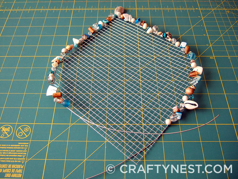 DSCF7654-wire-mesh-jewelry-holders-with-beads-crafty-nest Use a shorter piece of wire, photo