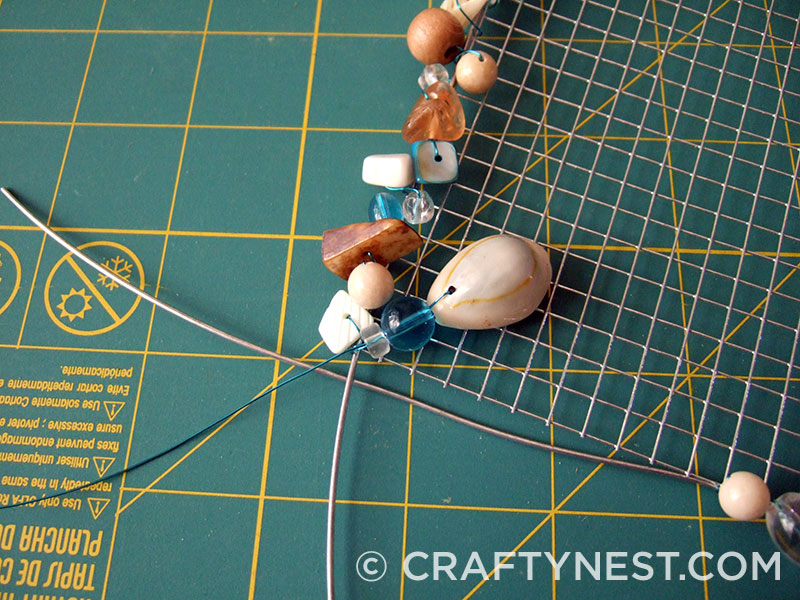 DSCF7658-wire-mesh-jewelry-holders-with-beads-crafty-nest Wire a few beads hanging down at the top, photo
