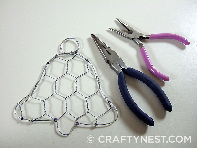 DSCF7845-chicken-wire-jingle-bell-ornament-crafty-nest Wrap chicken wire around edges of bell, photo