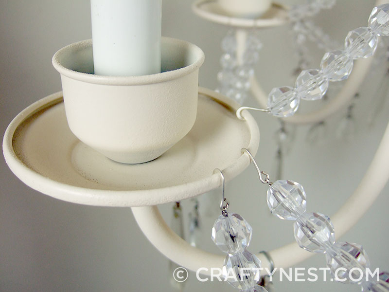 DSCF8306-chandelier-makeover-the-tutorial-crafty-nest Strands connected to candle cup, photo