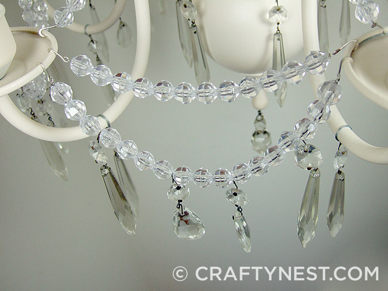 DSCF8307-chandelier-makeover-the-tutorial-crafty-nest Hang your strands from the cups, photo