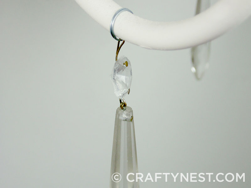DSCF8309-chandelier-makeover-the-tutorial-crafty-nest Wrap a crytal around the arm, photo