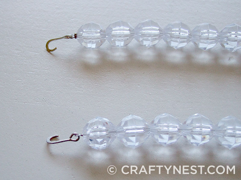 DSCF8314-chandelier-makeover-the-tutorial-crafty-nest Hooks at the ends of the bead strands, photo
