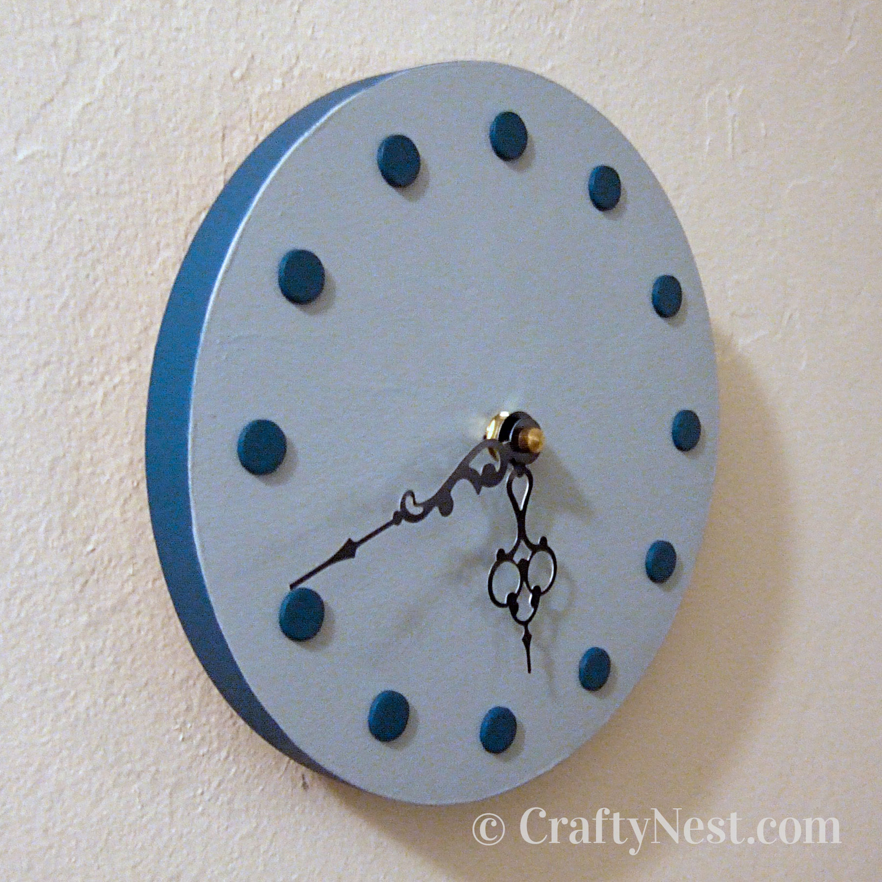 blue-side-lazy-susan-two-wooden-clocks-crafty-nest Side view of small clock, photo