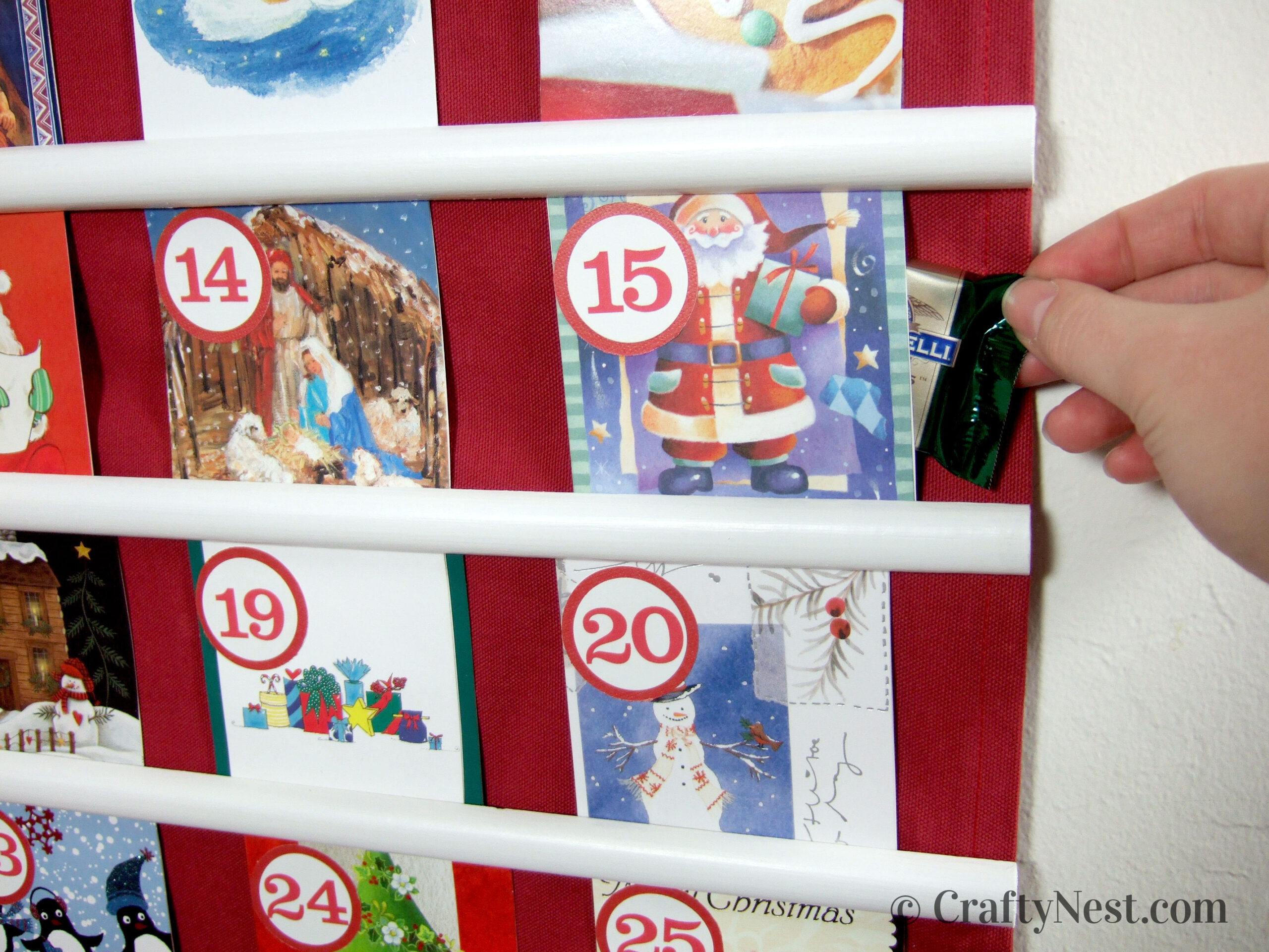 candy-recycled-Christmas-card-advent-calendar-crafty-nest Slip treat behind each card, photo