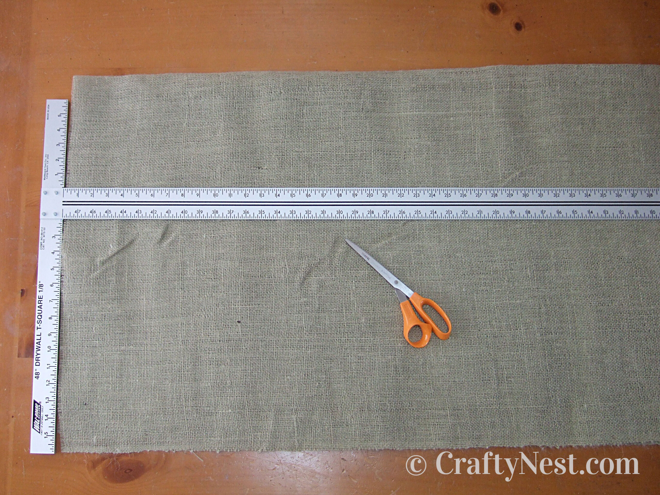 fabric-drywall-ruler-crafty-nest Drywall T-square used to cut fabric, photo