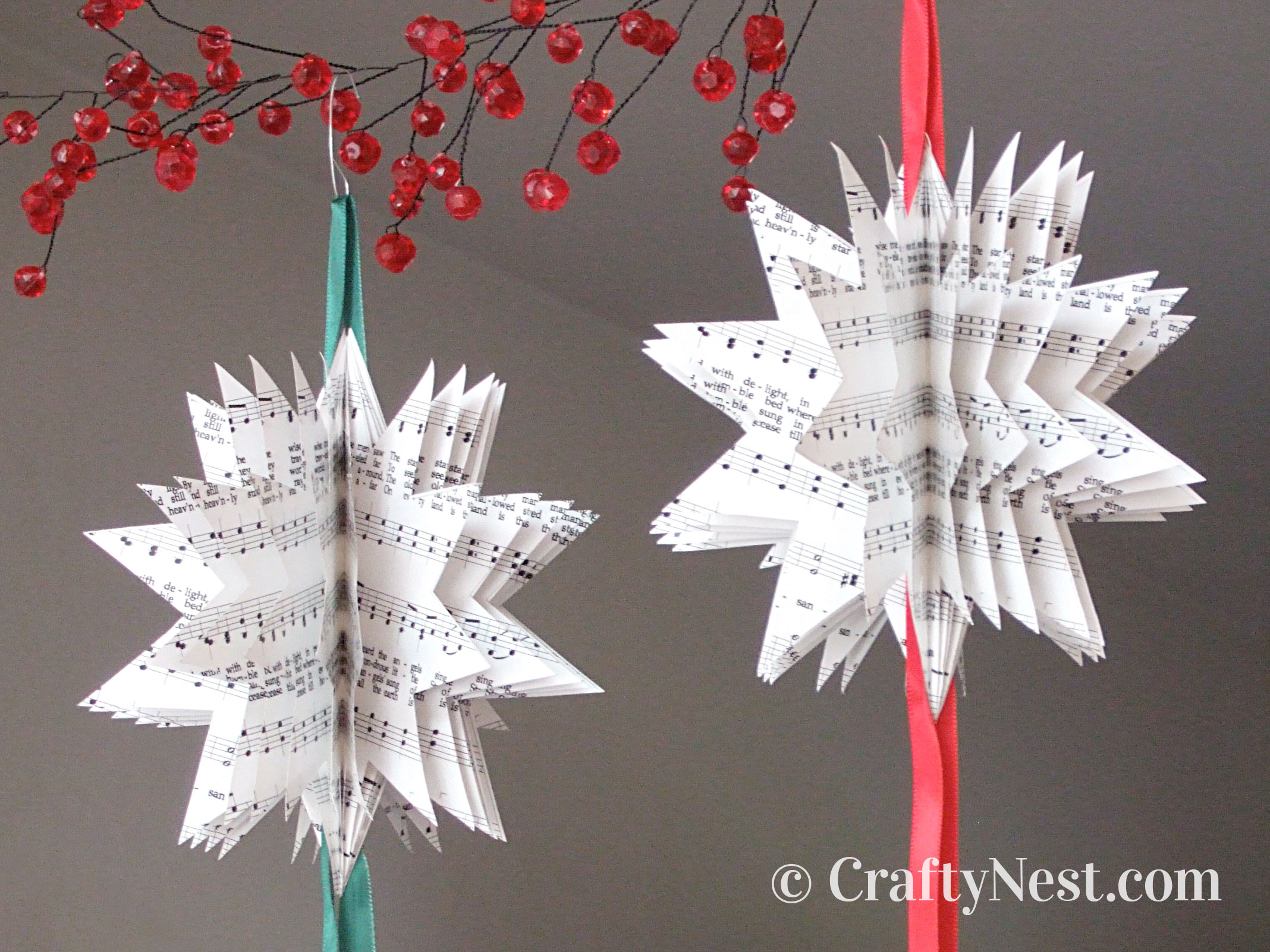 feature-sheet-music-Christmas-tree-ornaments-crafty-nest Two Christmas ornaments made with sheet music, photo