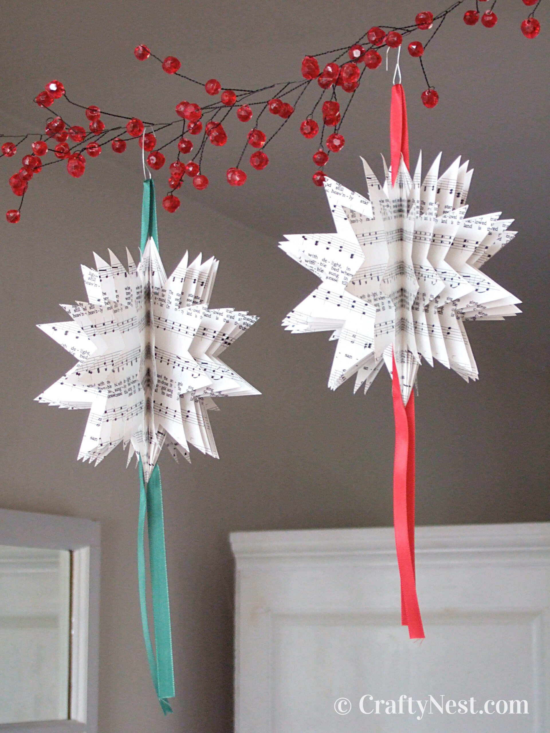 hero-sheet-music-Christmas-tree-ornaments-crafty-nest Two Christmas ornaments made with sheet music, photo