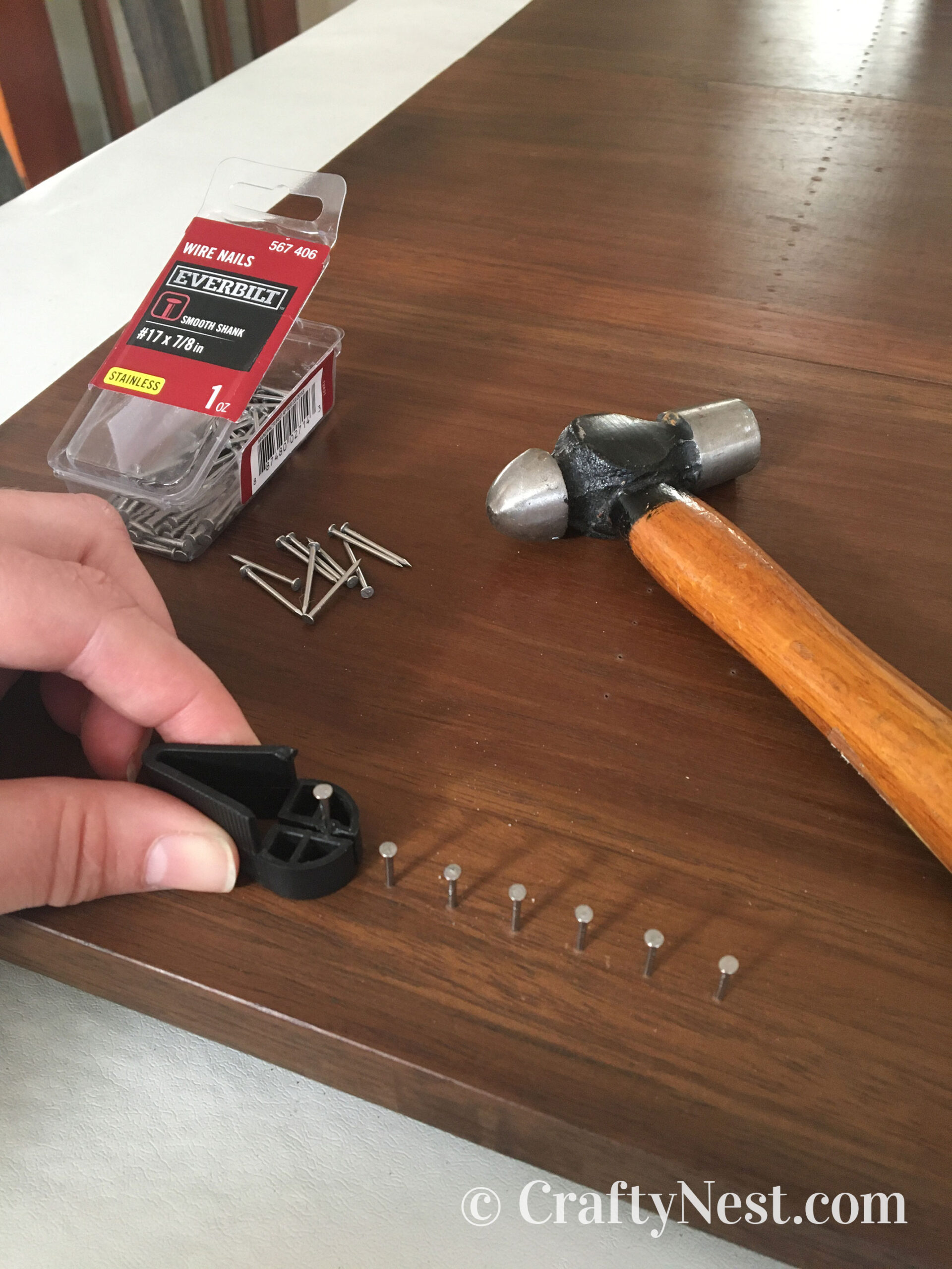 nail-tool-advent-calendar-string-art-tree-with-lights-crafty-nest Hammering nails with nail holder, photo