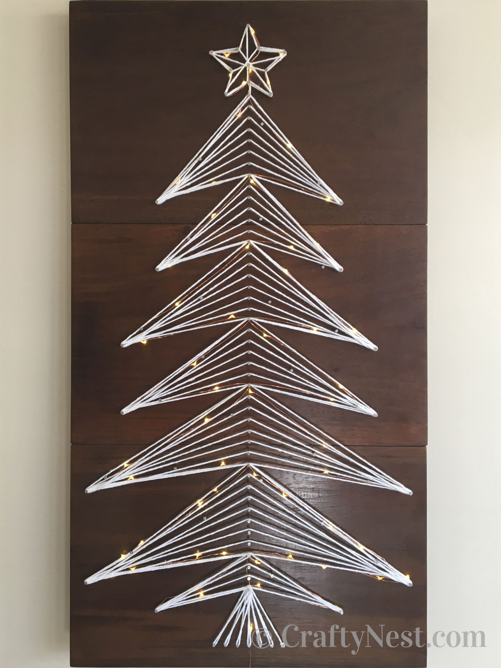 string-advent-calendar-string-art-tree-with-lights-crafty-nest Wind the string around the nails, photo
