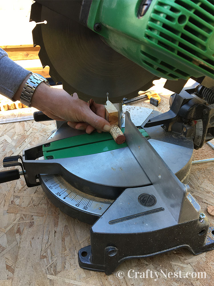 step1-woven-wine-cork-trivet-crafty-nest Cutting corks on a miter saw, photo