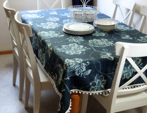 Fabric + pom-pom trim = DIY tablecloth